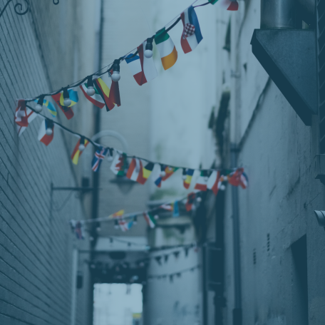 Belfast alley with flags from around the world